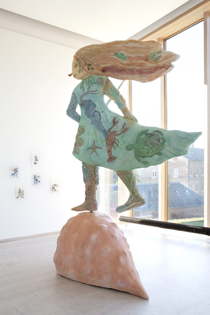 A large sculpture depicting a Sea Witch.